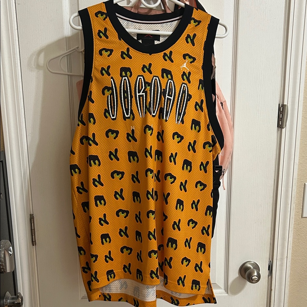 Jordan Gold and Black Graphic Jersey
